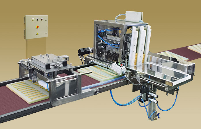 Biscuit laying machine